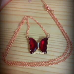 Collier papillon rouge